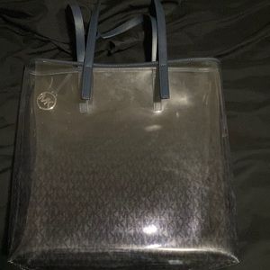 Brand new never used Michael Kors clear tote bag never used